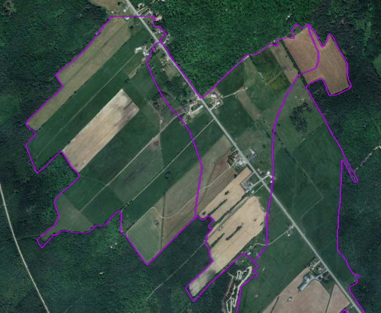Photographie aérienne d'un polygone de terres agricoles.